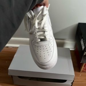 these are white air forces a size 9.5 in men’s and a size 11 in women’s for sale